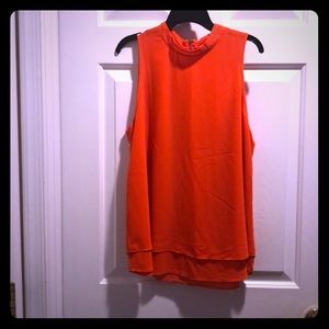 Orange sleeveless shirt